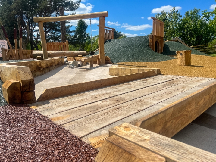 A wet play area, photo shows a bridge going over a stream